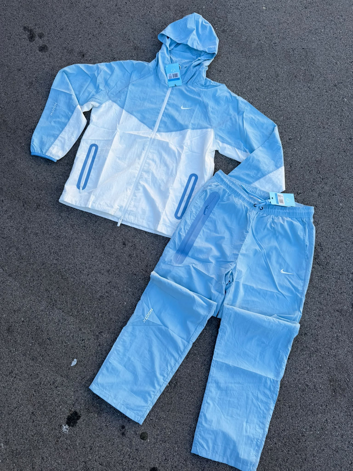 `Chándal Nike x NOCTA Windrunner Azul Celeste / Blanco