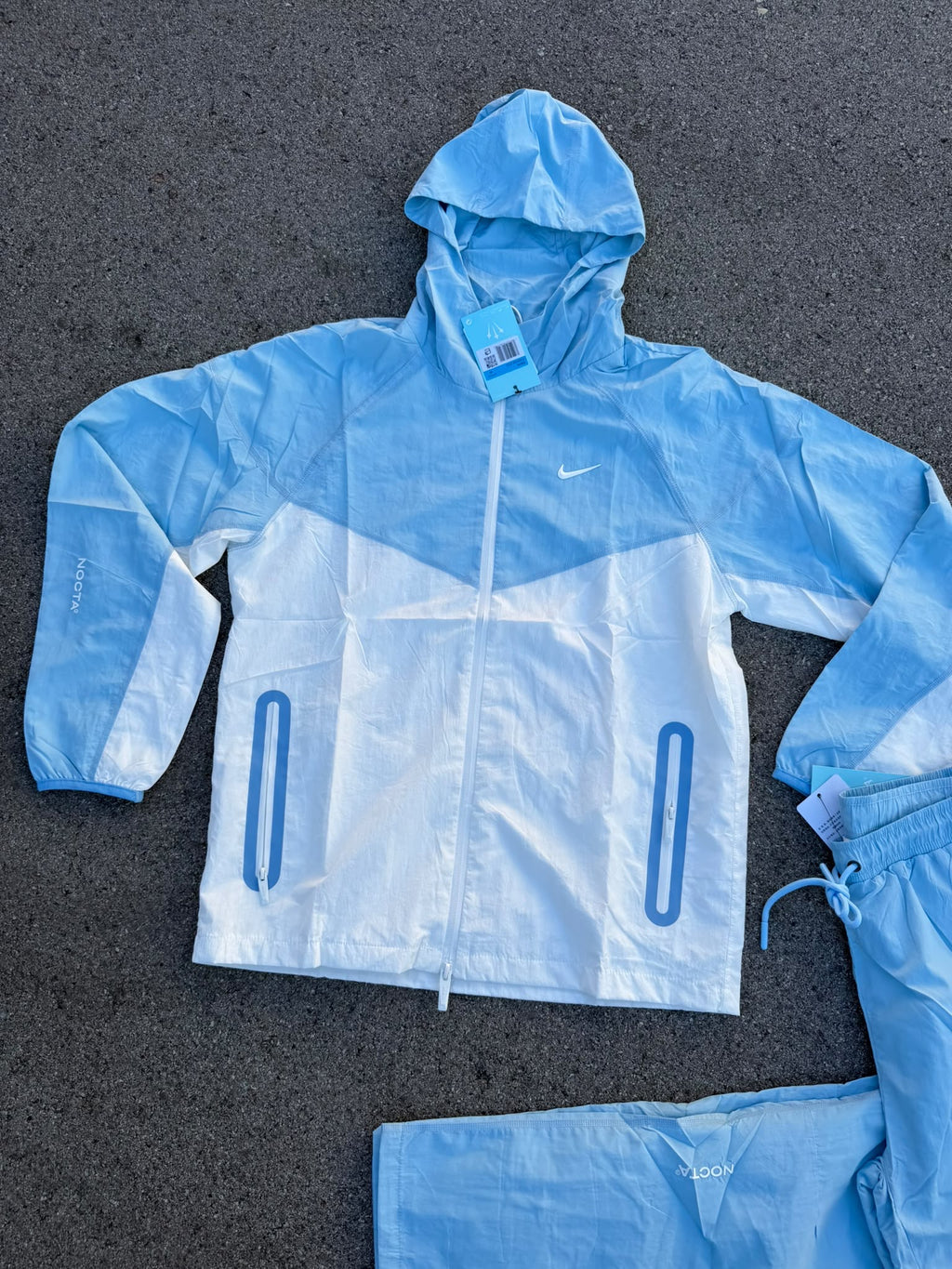 `Chándal Nike x NOCTA Windrunner Azul Celeste / Blanco