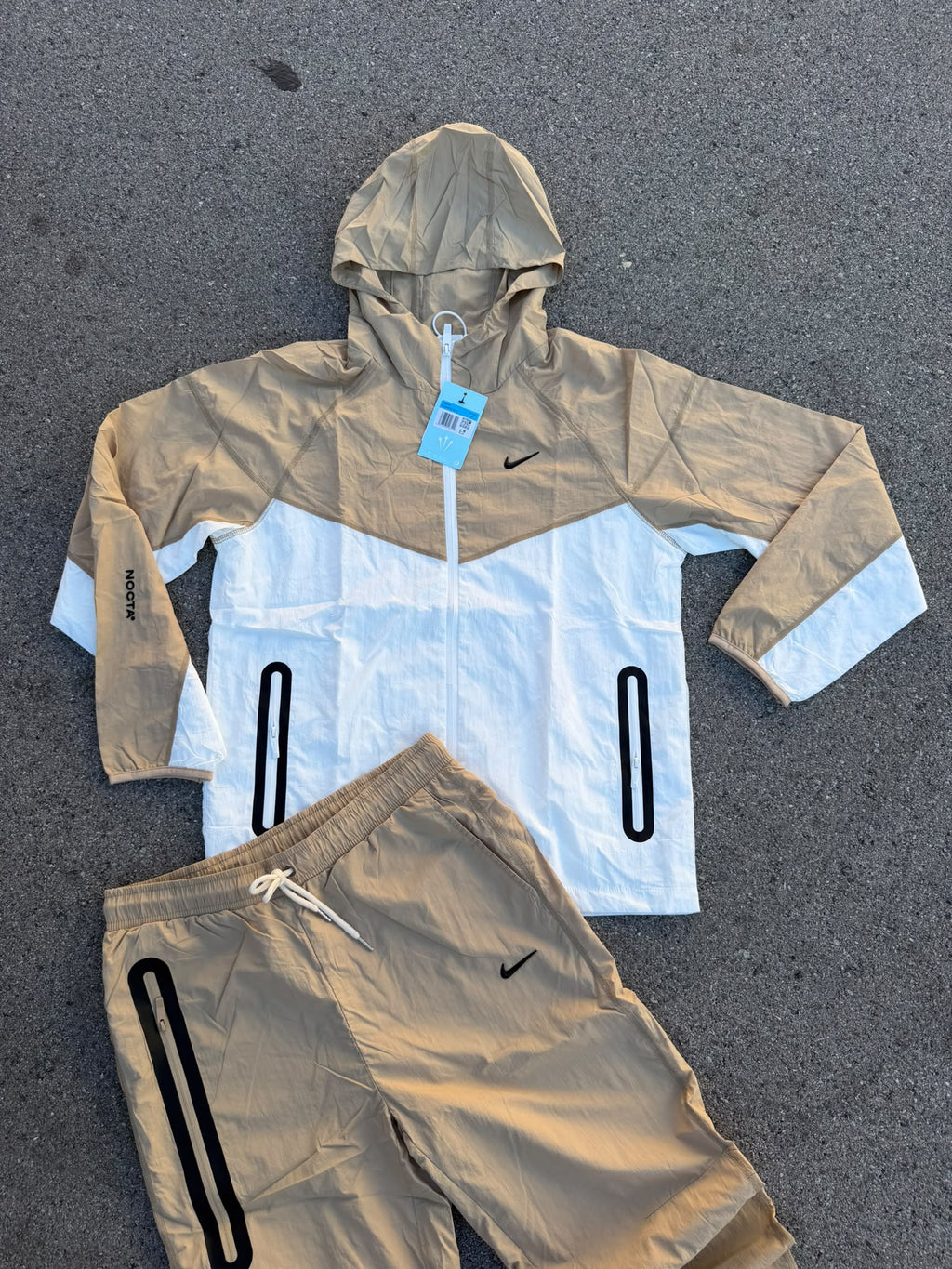 Chándal Nike x NOCTA Windrunner Beige / Blanco