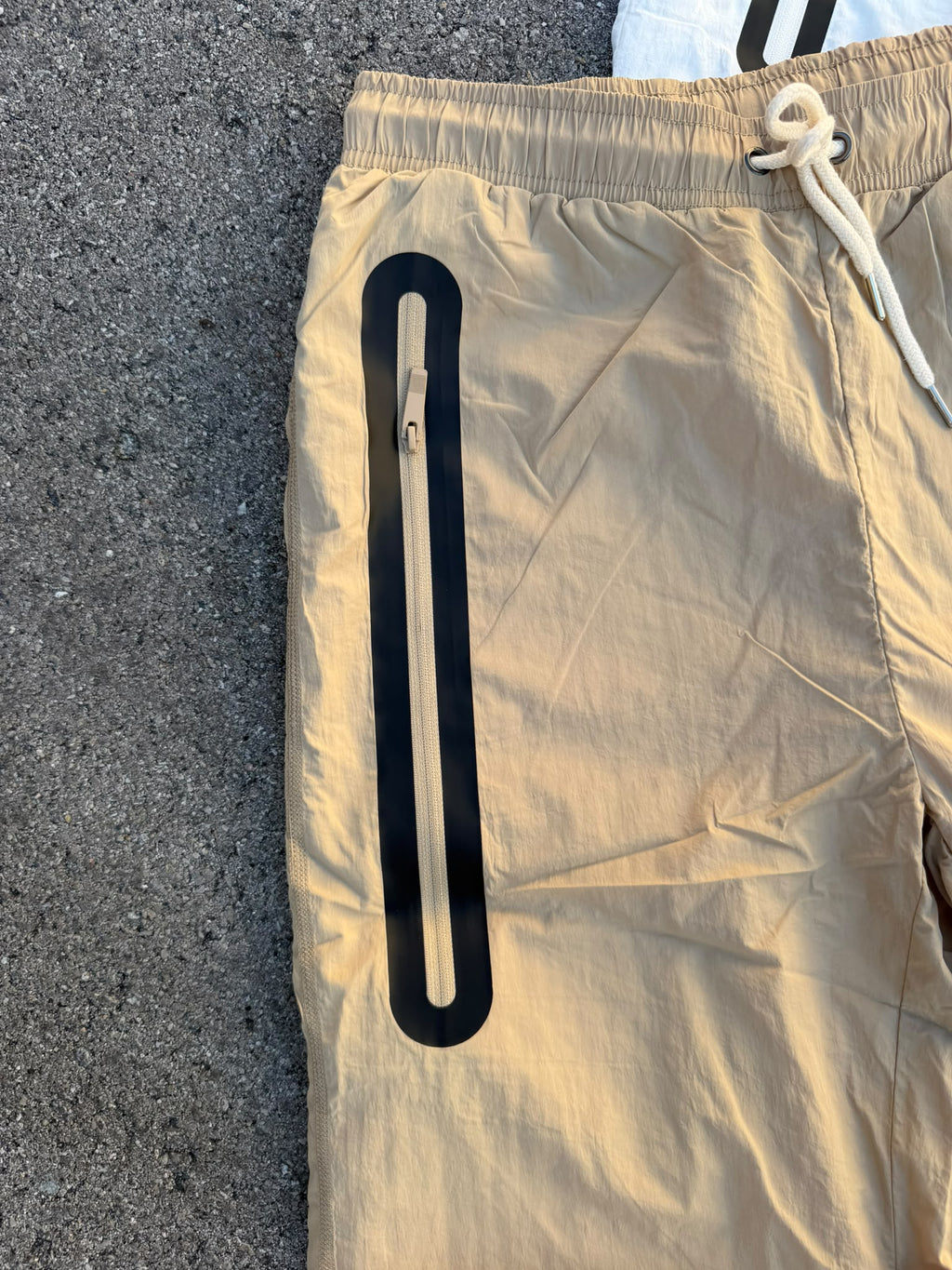 Chándal Nike x NOCTA Windrunner Beige / Blanco